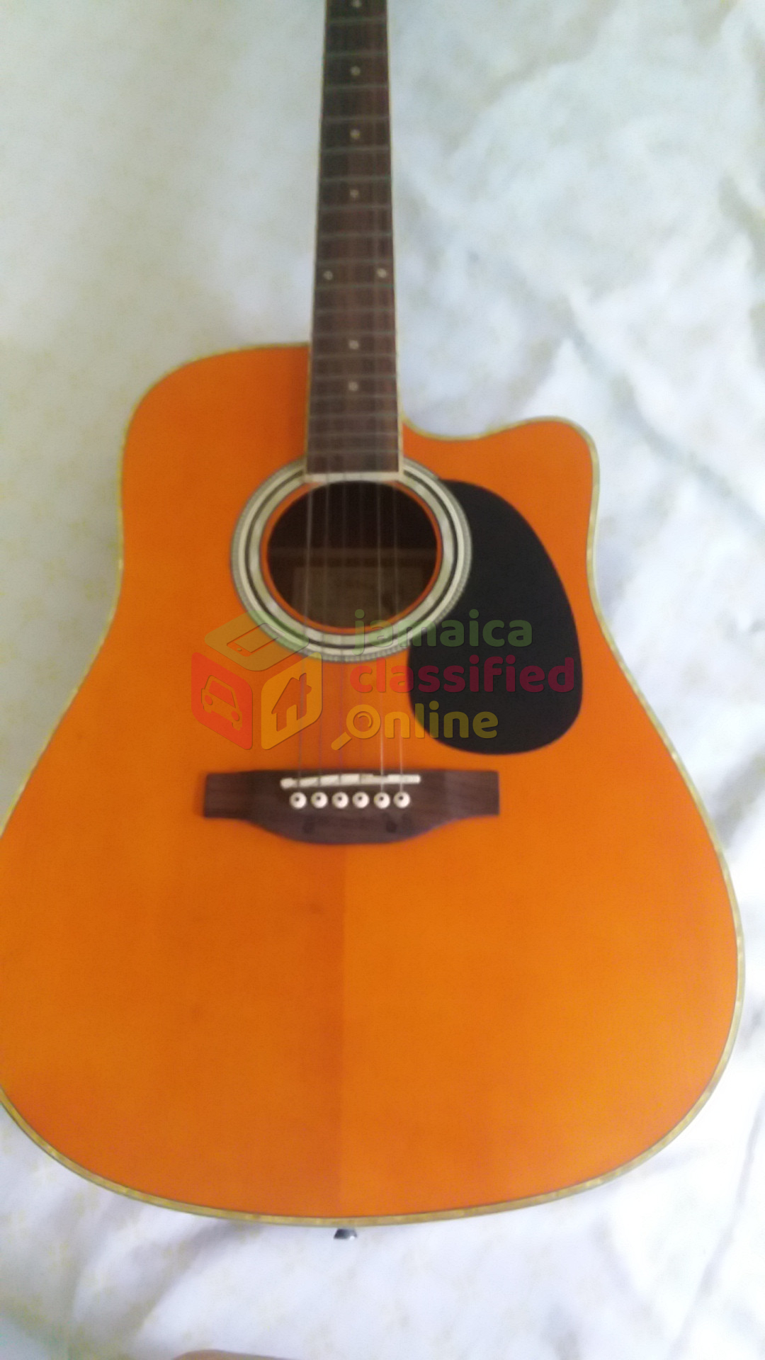 For Sale: Guitar That Work Both Electric And Acoustic
